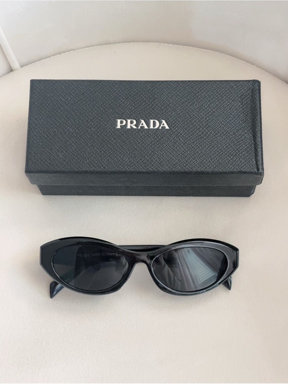 Prada Black Cat-Eye Sunglasses with Dark Lenses